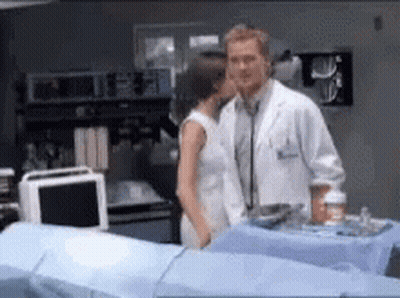 Doctor And Nurse Kissing GIF