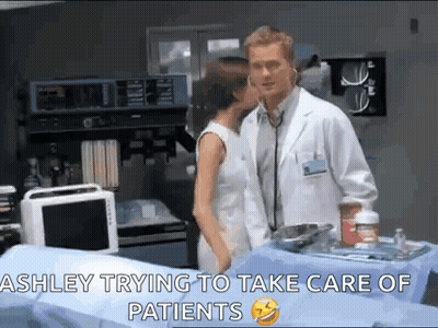 Doctor And Nurse Kissing While Ashley Tries To Help Patients GIF