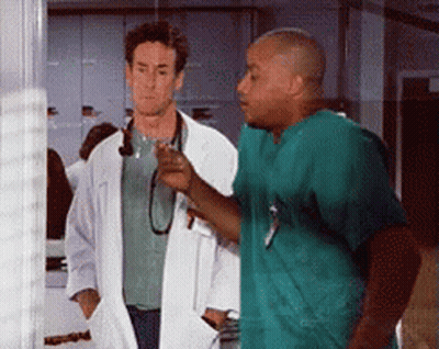 Doctor And Nurse Standing Together GIF