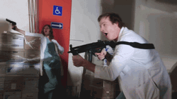Doctor Firing The Machine Gun GIF