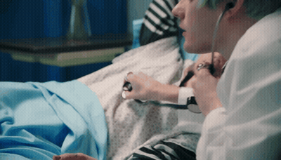 Doctor Listening With Stethoscope GIF