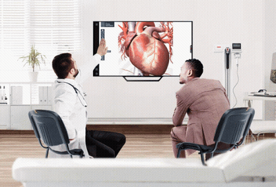 Doctor Showing Patient Heart On TV Screen GIF