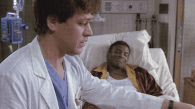 Doctor Talking To Patient In Hospital Bed GIF