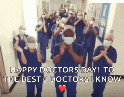 Doctors In Masks And Scrubs Applauding GIF