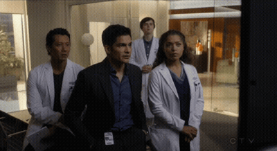 Doctors Standing In Room With CTV Logo GIF