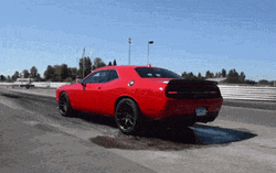 Dodge Challenger Red Smoke Out