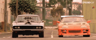 Dodge Charger And Toyota Supra Parked Side By Side GIF