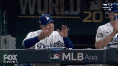 Dodgers Baseball Player Applauds In Front Of Fox Deportes Sign GIF