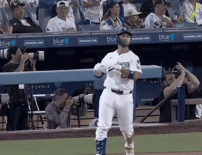 Dodgers Baseball Player In Front Of Blue Dugout GIF