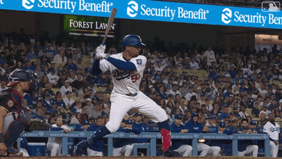 Dodgers Baseball Player Swinging at Pitch