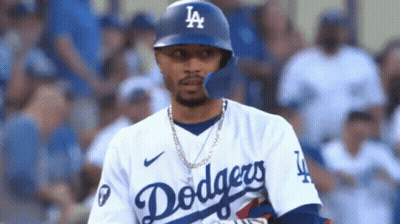Dodgers Baseball Player Wearing Helmet And Necklace GIF
