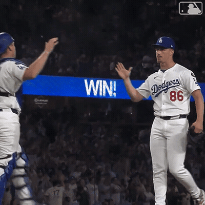 Dodgers Player High Fives Teammate In Front Of Win Sign GIF