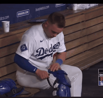 Dodgers Player Sitting On Dugout Bench GIF