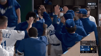 Dodgers Players Celebrate In Dugout GIF
