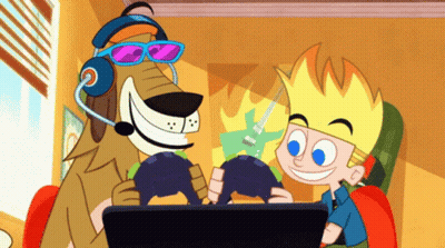 Dog And Boy Playing Video Game On Laptop GIF