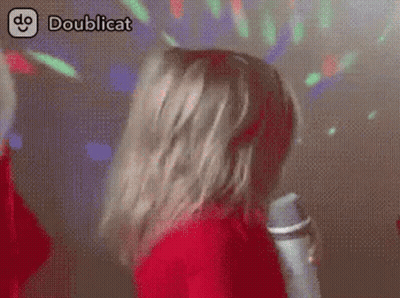 Dog In Front Of Pink And Purple Lights GIF
