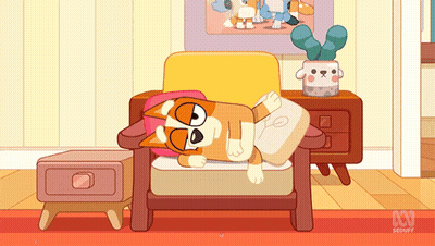 Dog Laying On Chair With ABC Logo GIF