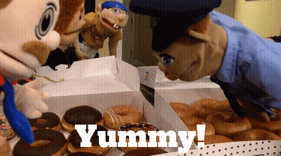 Dog Licking Child's Face In Bed GIF