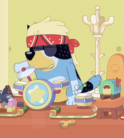 Dog Wearing Sunglasses And Bandana Playing Drums GIF