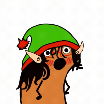 Doll Dressed As Elf On Wooden Table GIF