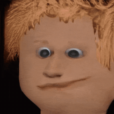 Doll Face Close Up With Big Eyes And Smile GIF
