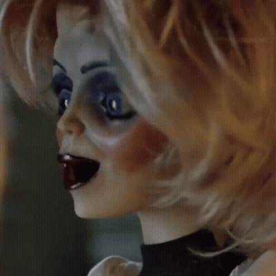 Doll Face With Big Blue Eyes GIF