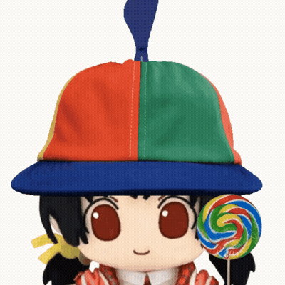 Doll in Colorful Hat Holding Lollipop