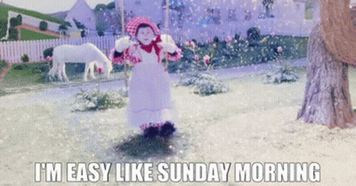 Doll In Garden Saying I'm Easy Like Sunday Morning GIF