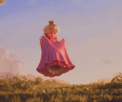 Doll In Pink Dress Jumping In Field GIF