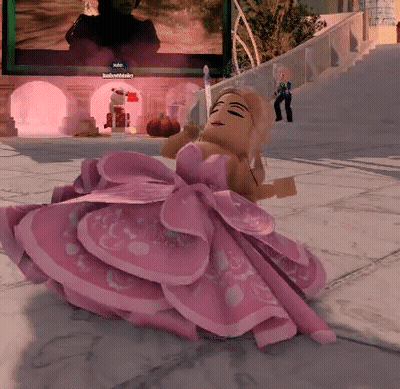 Doll In Pink Dress Sitting GIF