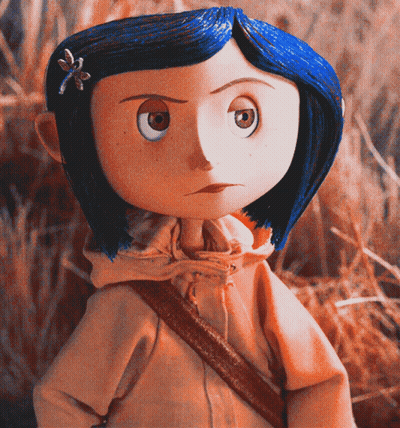 Doll With Blue Hair And Flower Standing In Field GIF