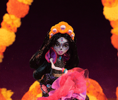 Doll With Skulls On Head And Cross On Face GIF