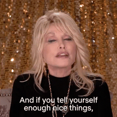 Dolly Parton In Black Top And Gold Necklace Saying And If You Tell Yourself Enough Nice Things GIF