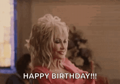 Dolly Parton In Pink Dress Saying Happy Birthday GIF