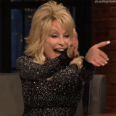 Dolly Parton Is Laughing And Pointing At Something GIF