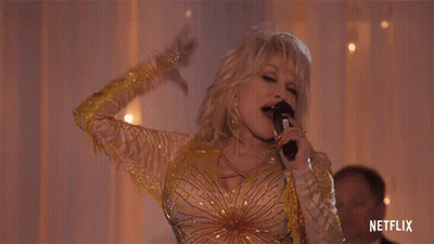 Dolly Parton Singing Into Microphone Netflix Logo GIF
