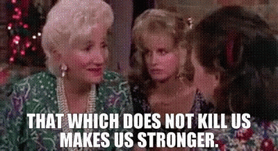 Dolly Parton Smiling In Gold Dress And Earrings GIF