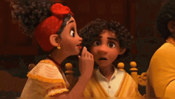 Dolores Madrigal Whispers To Camilo GIF