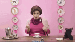 Dolores Umbridge Pointing At Coffee GIF