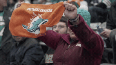Dolphins Fan Holding #MetLifeTakeover Towel GIF
