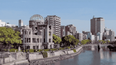 Domed Building Beside River In City GIF