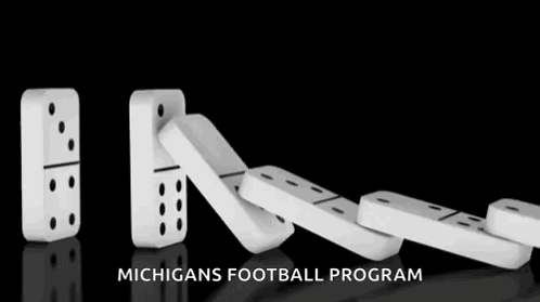 Dominoes Falling In A Row With The Words Michigans Football Program GIF