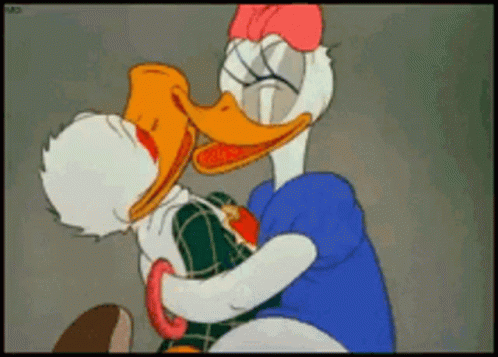 Donald Duck And Daisy Duck Are Hugging Each Other GIF
