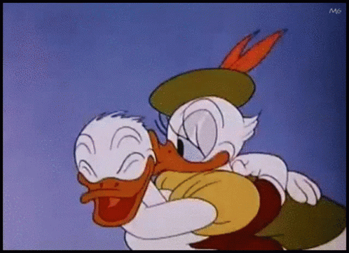 Donald Duck And Daisy Duck Hugging In A Cartoon GIF