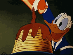 Donald Duck Happily Making Breakfast GIF