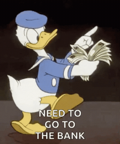Donald Duck Is Holding A Bunch Of Money And Pointing . GIF