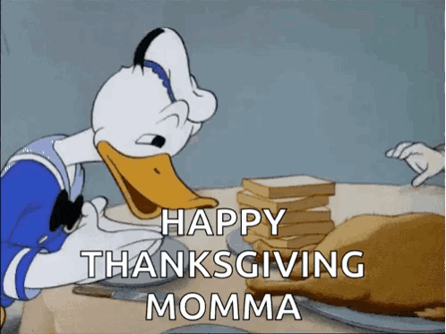 Donald Duck Is Sitting At A Table With A Turkey And Sandwiches And Wishing His Momma A Happy Thanksgiving GIF