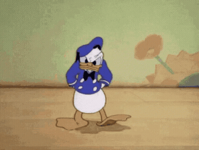 Donald Duck Is Standing On A Wooden Floor In A Room GIF