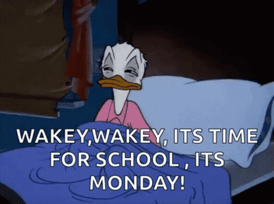 Donald Duck Lying In Bed Waking Up GIF