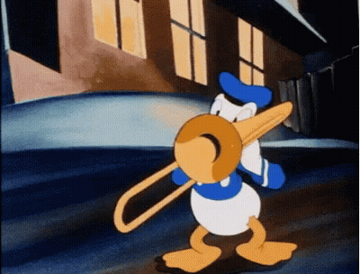 Donald Duck Playing Trombone In Front Of Building GIF